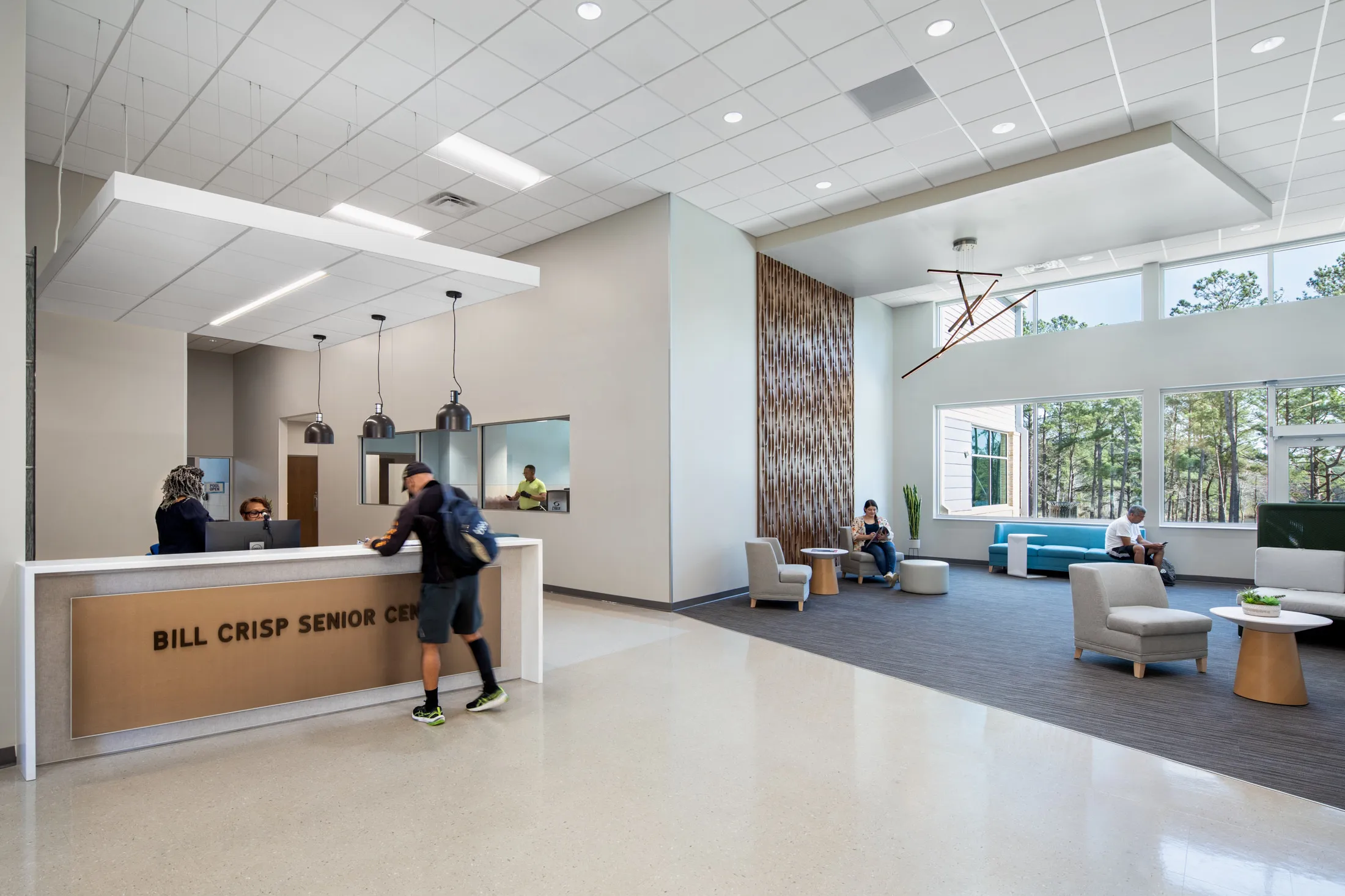 The front desk and lobby at the Bill Crisp Senior Center by HH Architecture