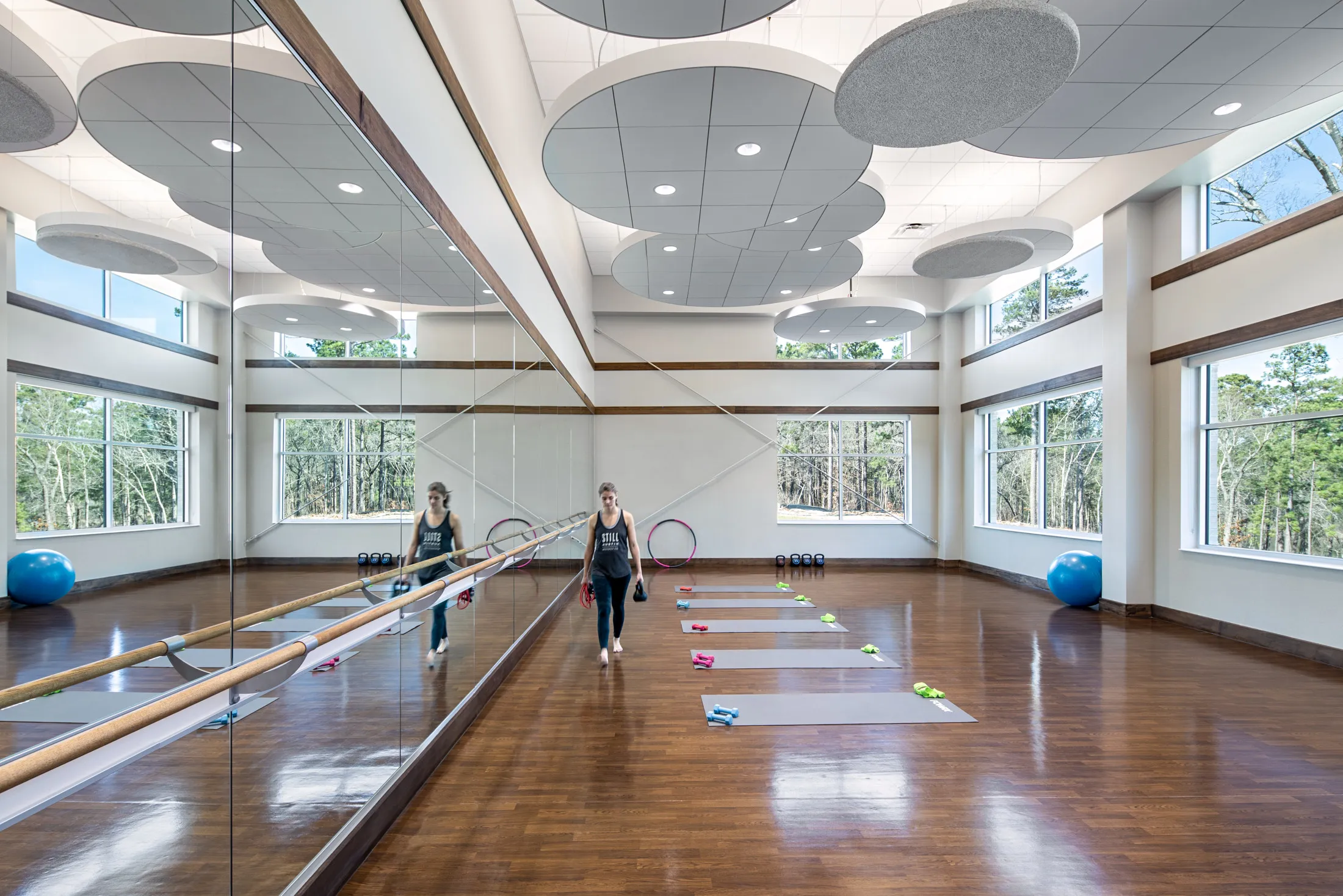 A physical therapy and exercise room at the Bill Crisp Senior Center by HH Architecture