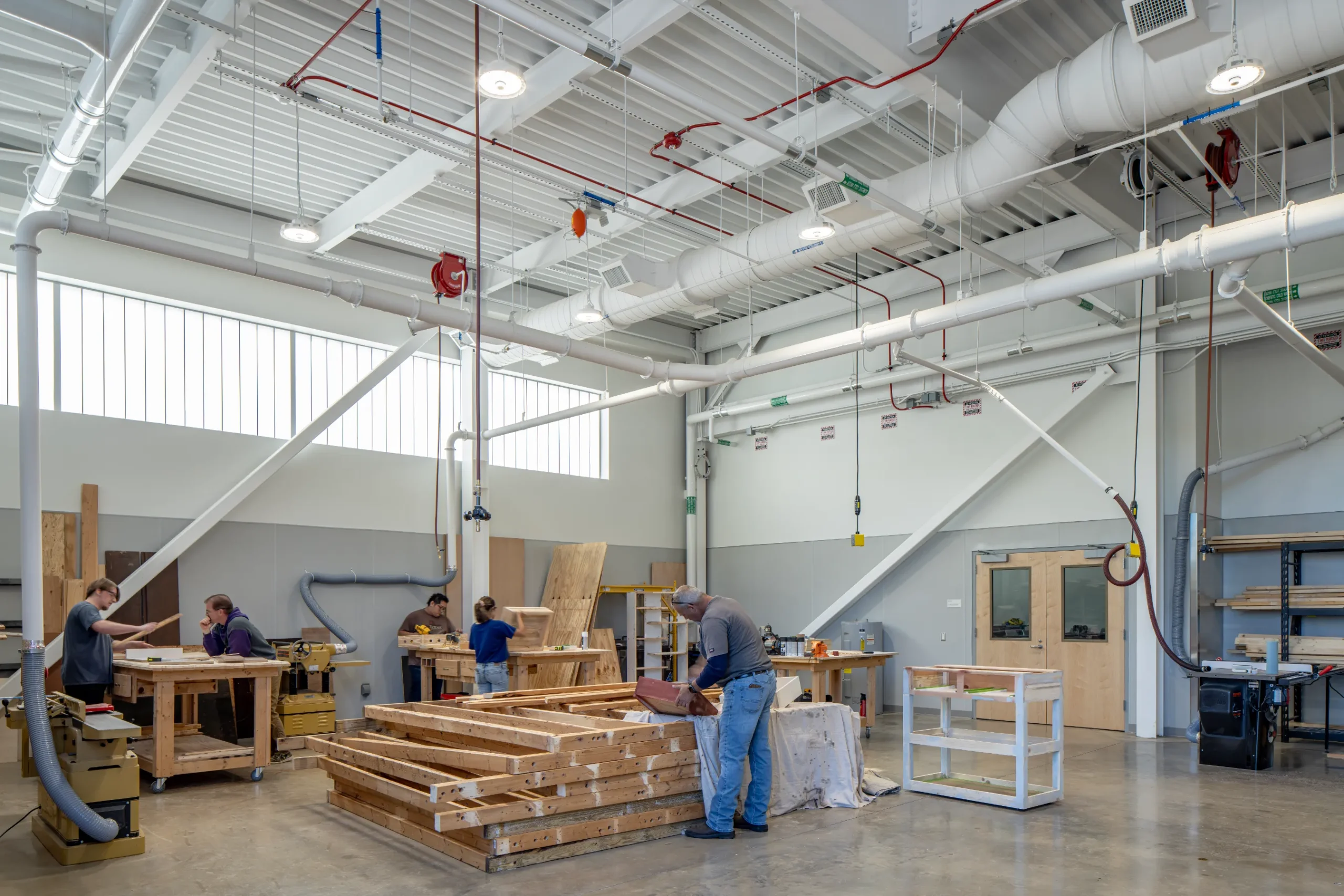 The woodshop inside of the Wilson CC's Building S by HH Architecture