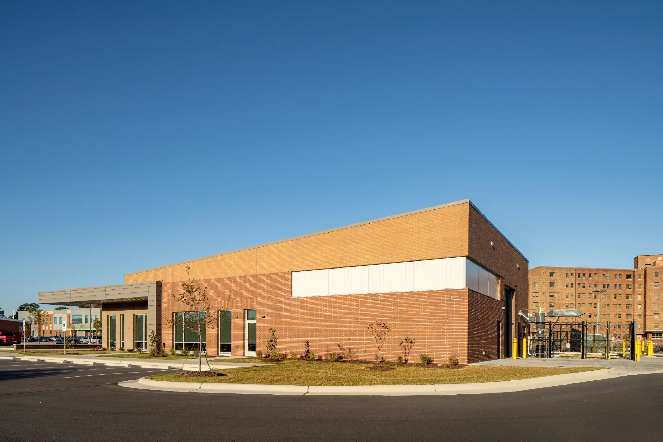 The exterior of the Wilson CC's Building S by HH Architecture at dawn